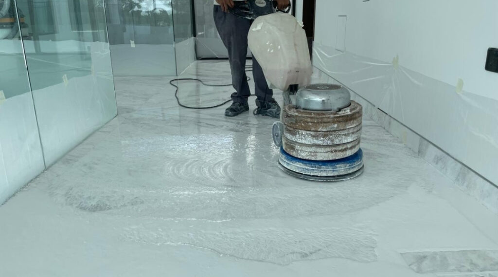Technician is doing marble polishing Dubai