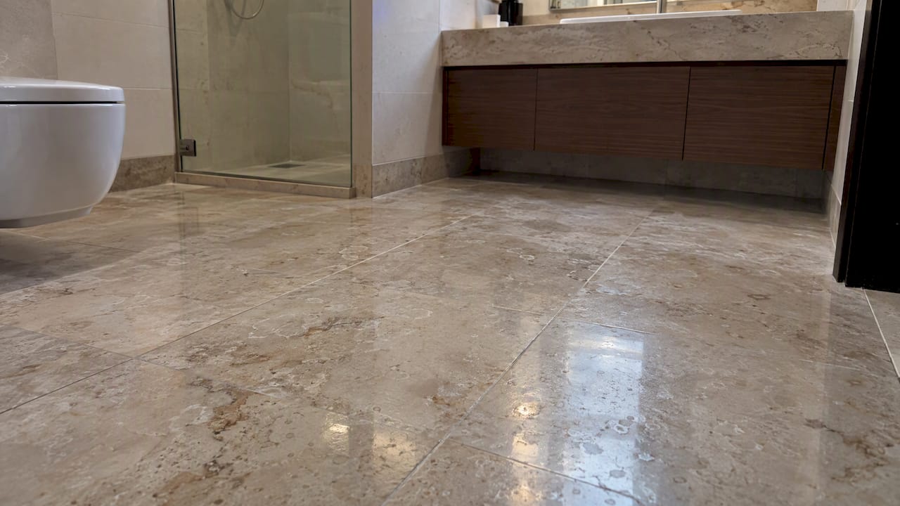 Dull marble floor with visible etching