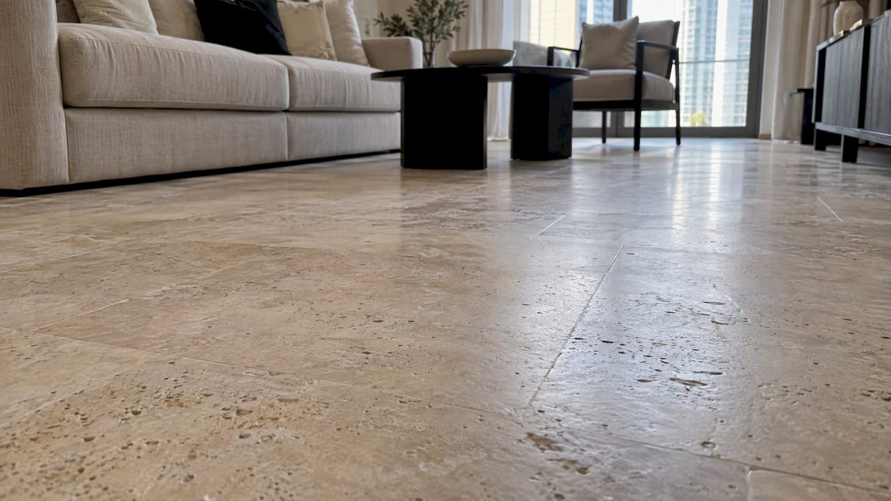 Matte honed travertine floor in an apartment