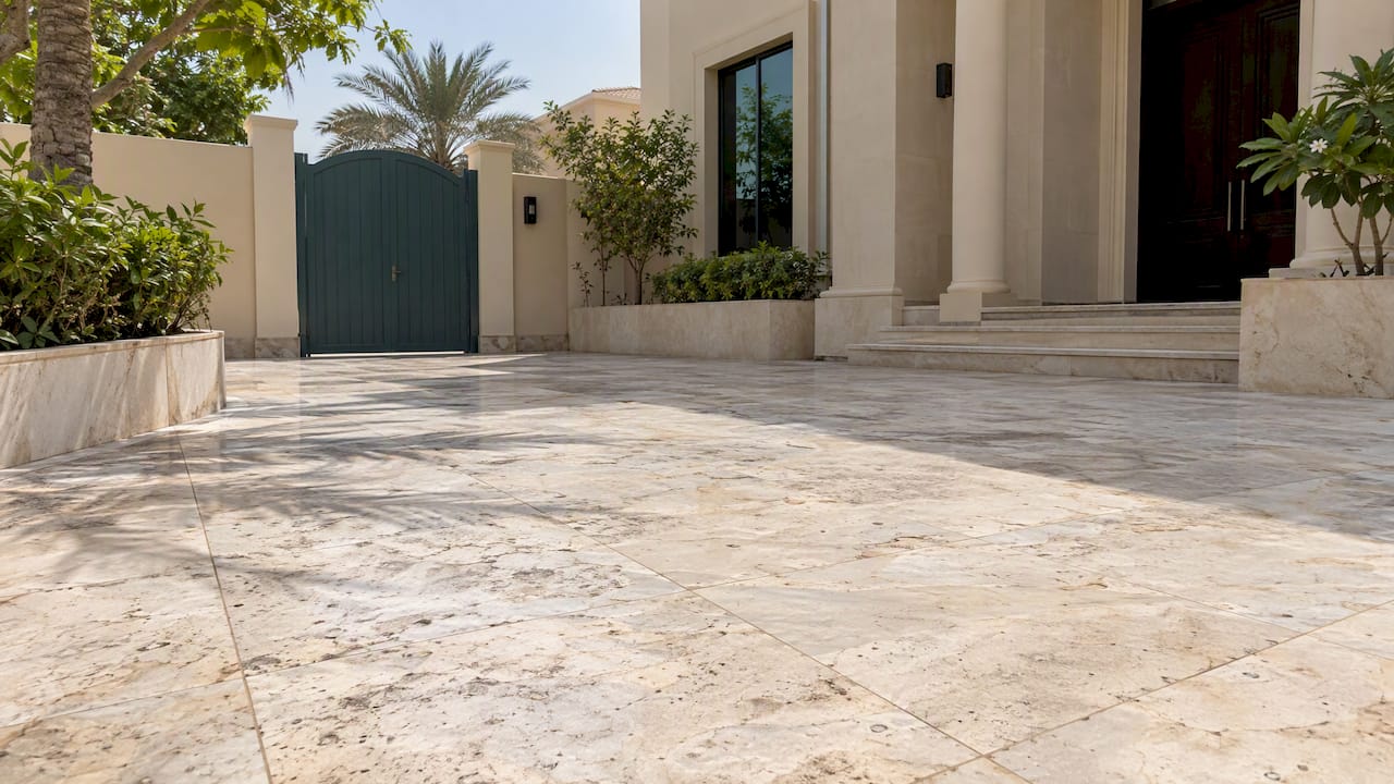 Weathered marble across a Dubai villa terrace