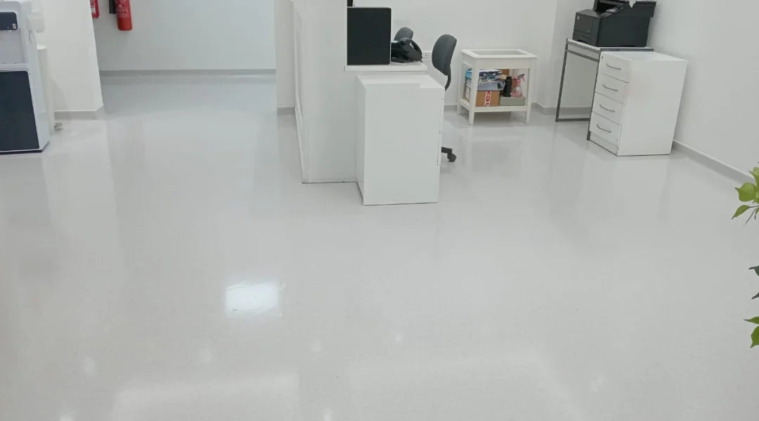 Glossy light-coloured flooring in a commercial interior